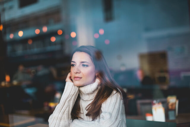 sad woman lonely in cafe