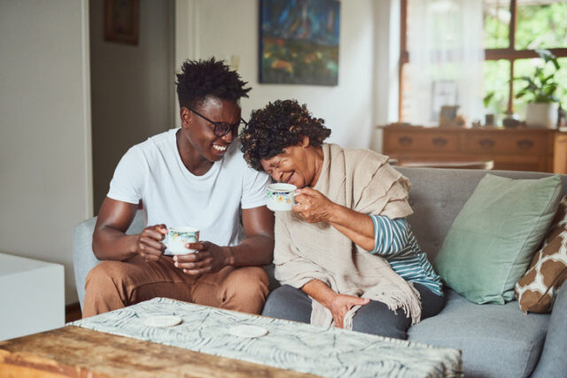 man laughing with his mom